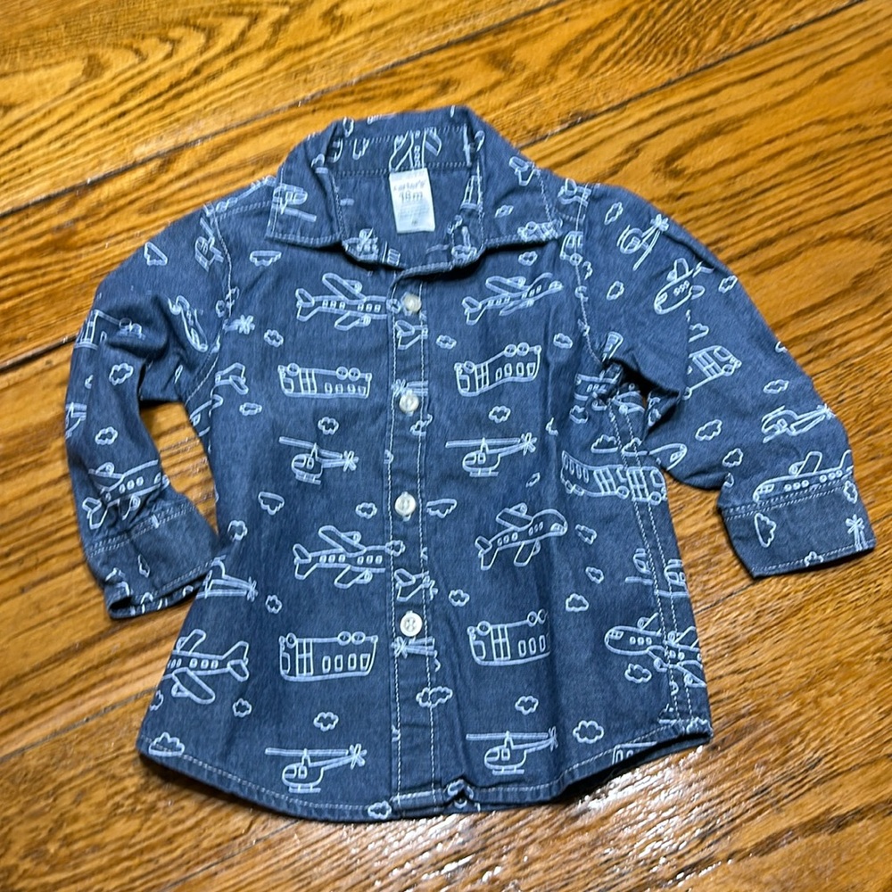 Carter’s blue and white long sleeve shirt. Excellent condition. Size 18 Months.
